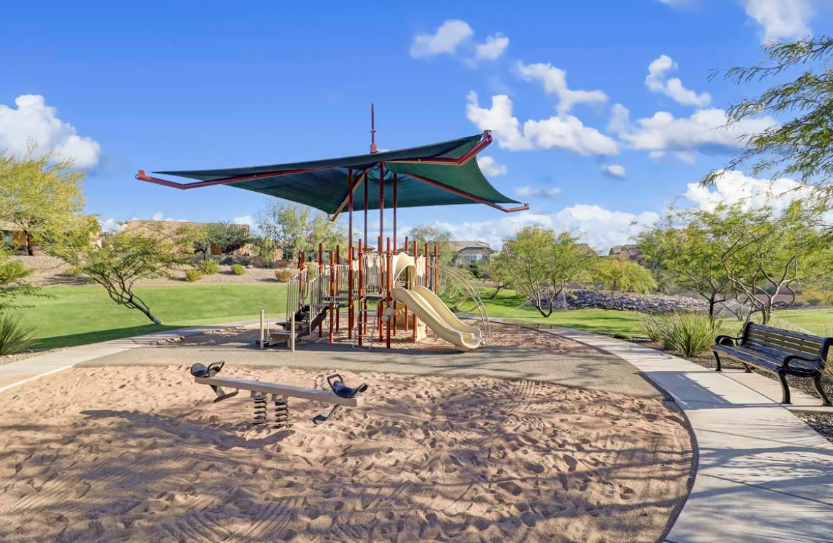 Shaded playground and greenbelt park inside Tierra Del Rio